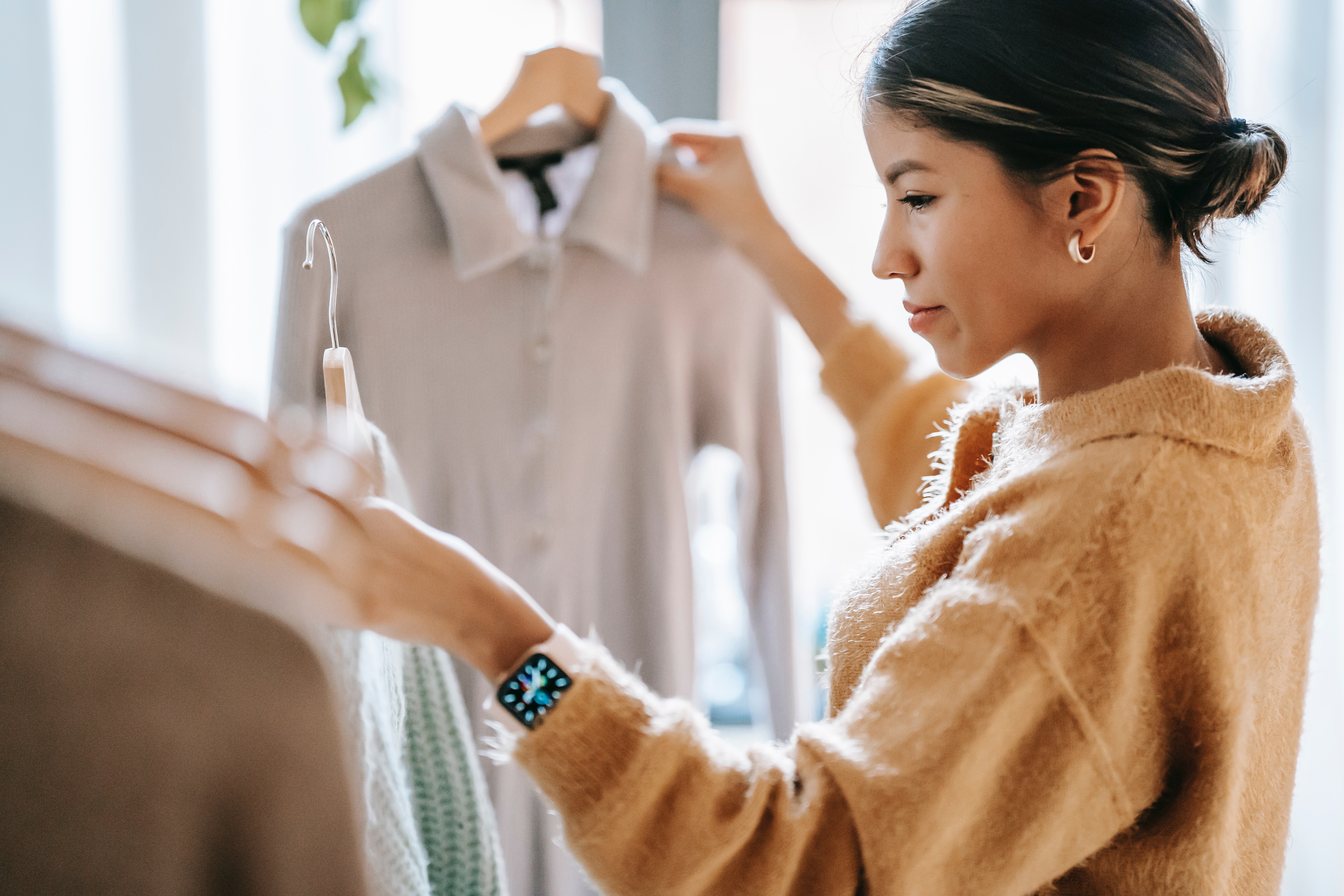 woman-comparing-two-shirts