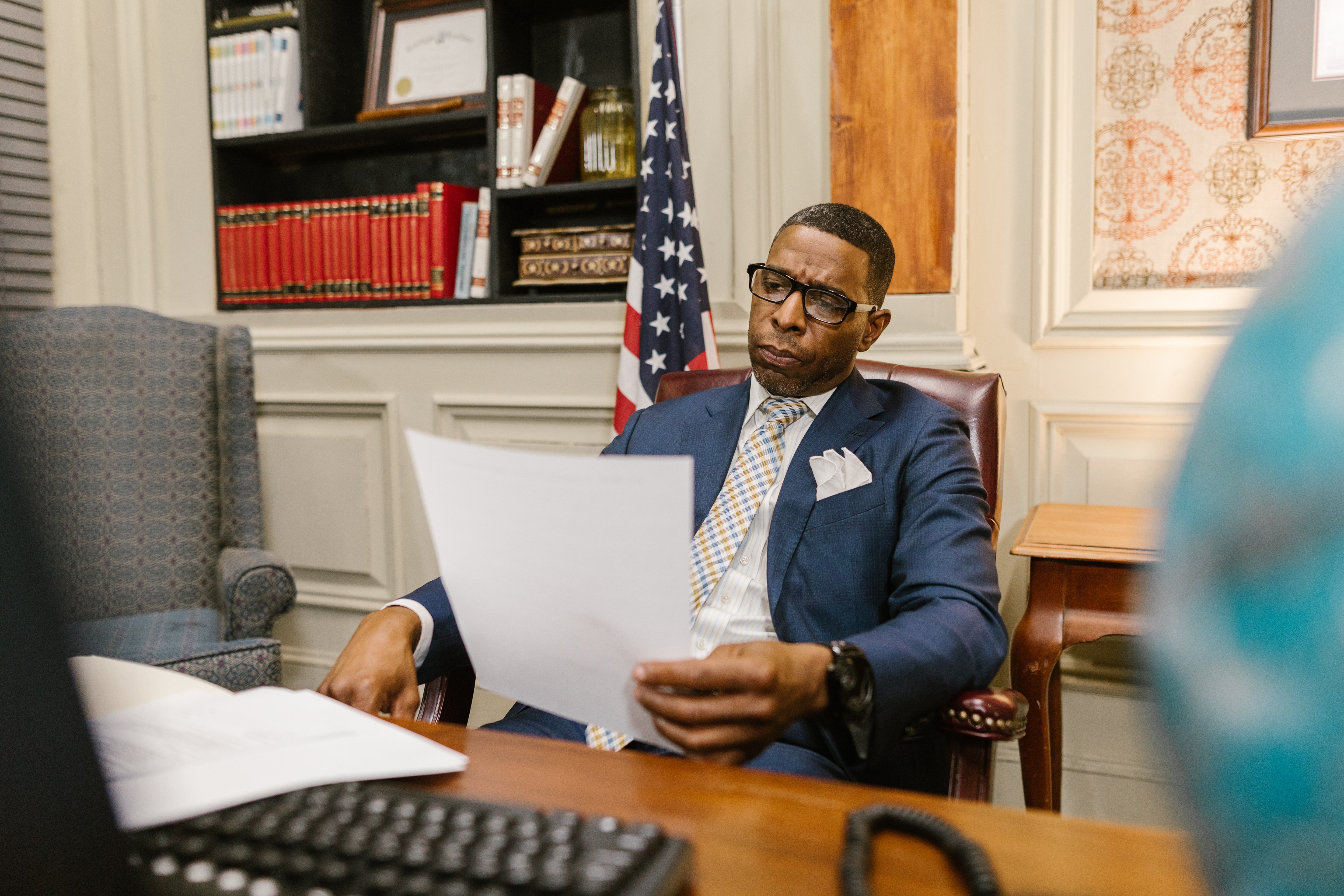 lawyer-reviewing-document-about-new-case-in-nice-office